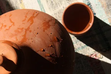 Clay jug and clay cup