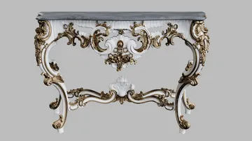 Antique ornate white and gold console table isolated