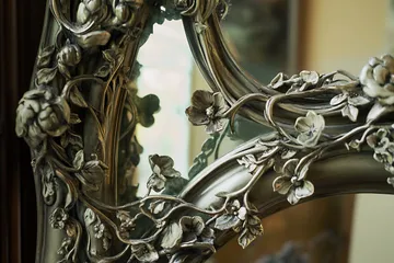 Closeup of Ornate Mirror Frame with Floral Detail