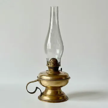 a lamp that has a lid that says quot the name of the sea quot