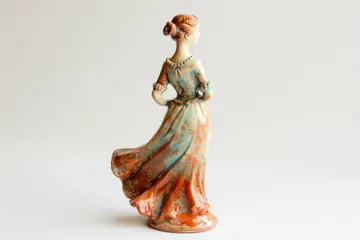 Porcelain figurine isolated on white background